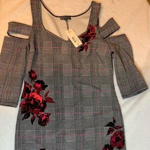 Black and white dress with red designs